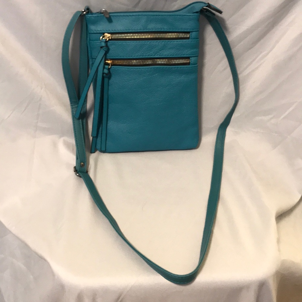 NWOT turquoise pebbles leather crossbody bag.